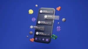 3D-Grafik: Smartphone mit Social-Media-Feed, umgeben von schwebenden Herzen, Sprechblase, @-Zeichen und Hashtag auf blauem Grund